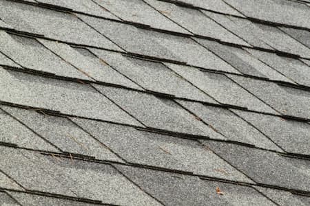 Asphalt shingles vs rubber roofing